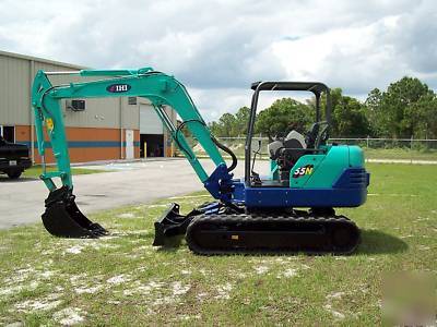 Ihi 55NX excavator, 08,618 hrs,12,773 lbs,& 22' trailer
