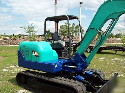 Ihi 55NX excavator, 08,618 hrs,12,773 lbs,& 22' trailer