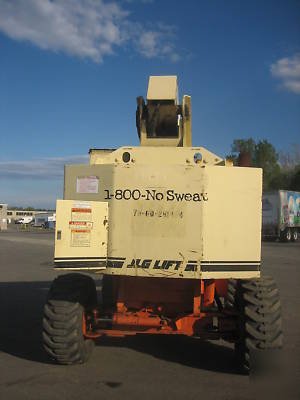 Jlg 60H 4WD dual fuel boomlift runs great jlg boom 