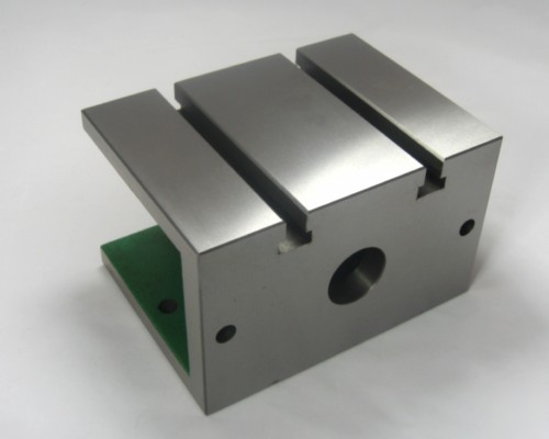 Milling machine table riser block