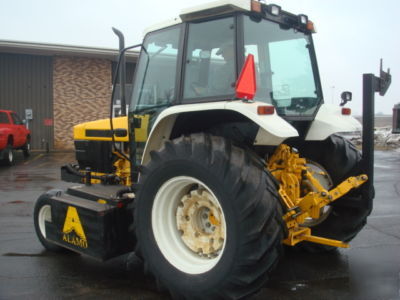 New 1994 holland ford 6640, cab, air, alamo boom mower