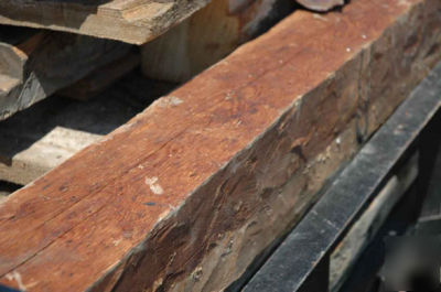 Reclaimed hand-hewn log siding (circa 1800 - 1850) 