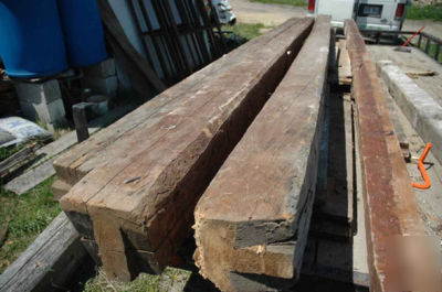 Reclaimed hand-hewn log siding (circa 1800 - 1850) 