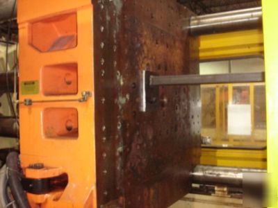 660 ton, 22.8 oz. + 36.1 oz. husky injection molder '97