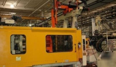 660 ton, 22.8 oz. + 36.1 oz. husky injection molder '97