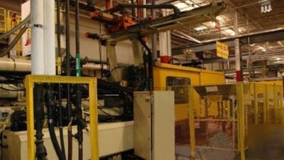 660 ton, 22.8 oz. + 36.1 oz. husky injection molder '97