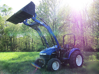 New holland TC40D 4X4 compact diesel tractor loader 