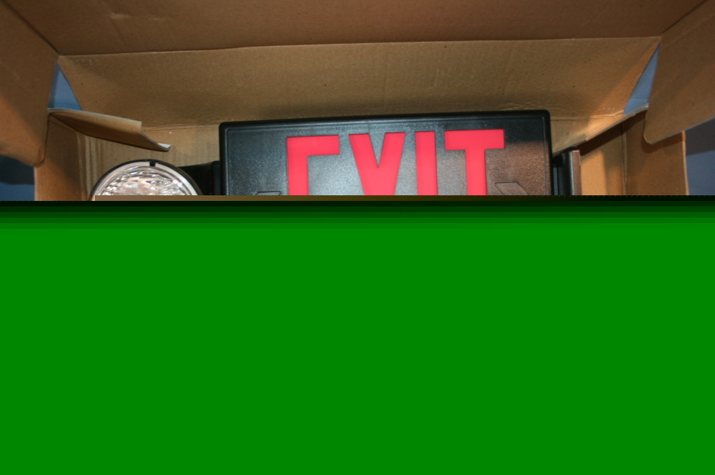 Sure-lites lighted exit sign w/ spotlight led light e